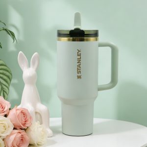 stanley quencher tumbler 40oz, elegant light sage green base & gold trim, stainless steel insulated cup with comfort grip handle