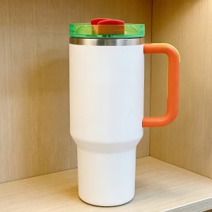 40oz tumbler | insulated cup with eye catching neon green & red accents & comfort grip handle, vacuum stainless steel, black