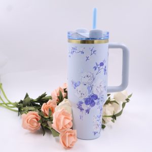 quencher h2.0 tumbler 40oz, cream white with purple bow & floral print, gold trim & light blue handle, insulated travel cup